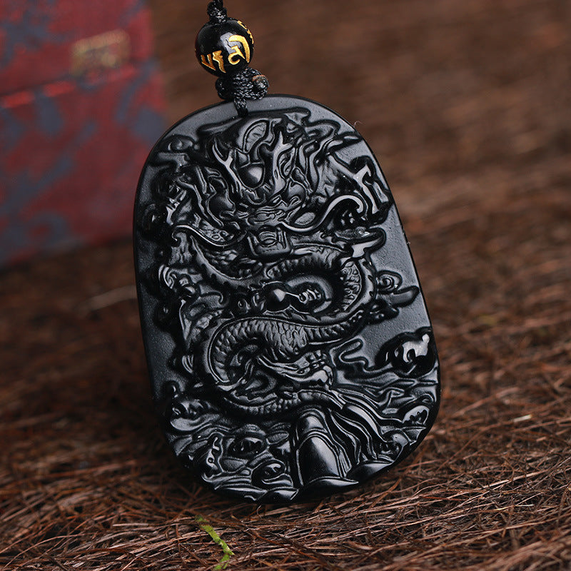 Carved Obsidian Dragon Pendant With Four Pieces